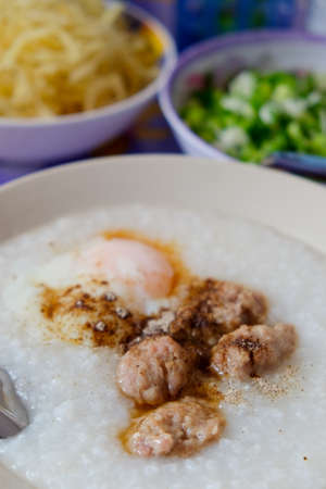 Rice porridge with ground pock and egg, Thai Cuisine Beast Breakfastの写真素材