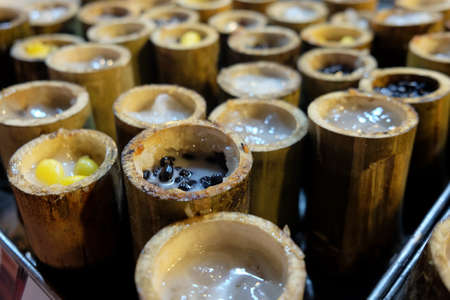 Glutinous rice roasted in bamboo (Name is Khoalam in Thailand)の写真素材