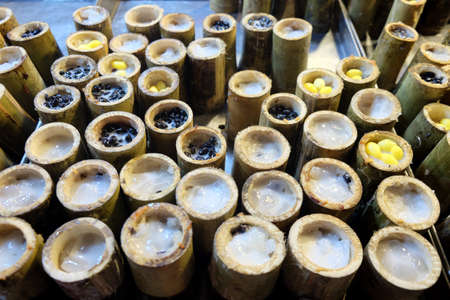 Glutinous rice roasted in bamboo joints (Khaolam Thai Dessert)の写真素材