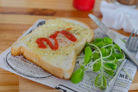 Egg in a bread, romantic breakfast. Selective focus.