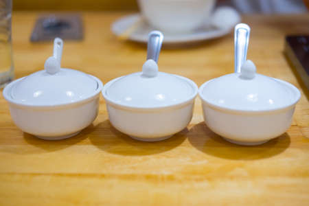 Ceramic bowl for sauces and condiments for Shabu and Sukiyaki on wood table