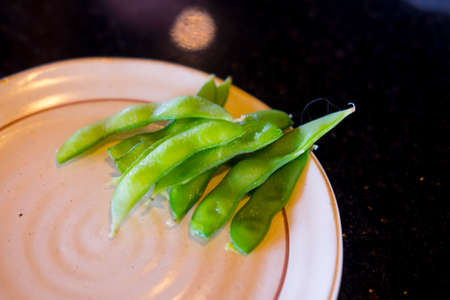 Green soybeans edamame japanese snack on plate