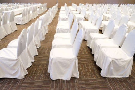 Row of white chairs prepare business meeting