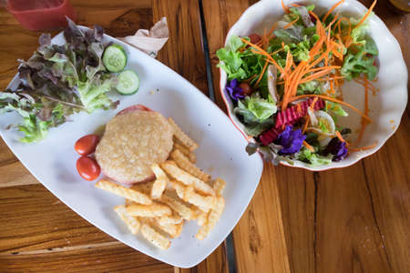 Fresh vegetable salad and pork steak. Healthy foodの写真素材