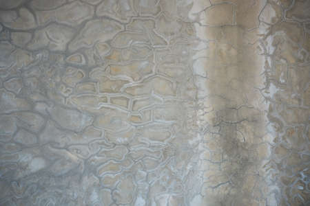 An old cement stone wall, a grunge cracked wall
