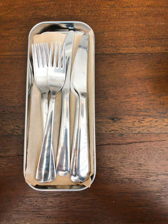 Forks and knives on tray ready to useの写真素材