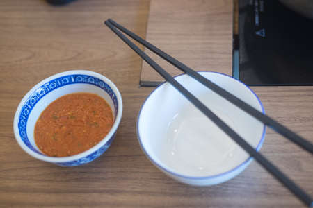 China suki-yaki sauce in bowl, closeup