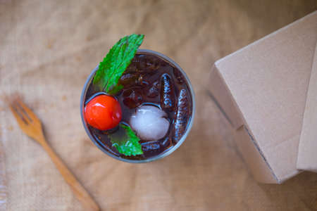 Homemade summer drink soft drink with  mint and cherry, top viewの写真素材
