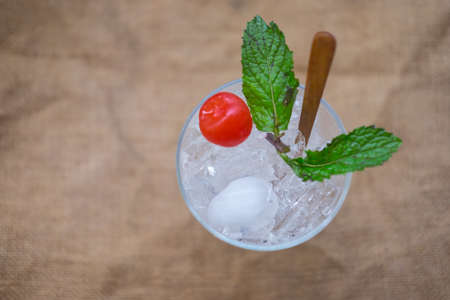 Cherry and mint on ice ready for cocktailの写真素材