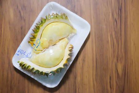 Ripe yellow flesh of Durian on foam box