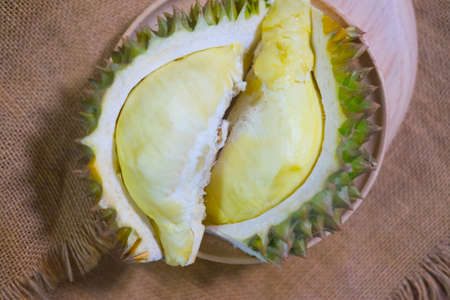 Durian fruit piece on a wooden plate (Durian king of fruit)の写真素材
