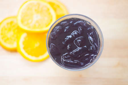 Black charcoal cold drink in glass (selective focus)