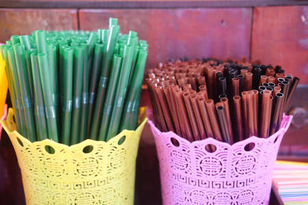 Colorful plastic drinking straws close upの写真素材