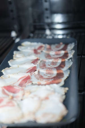 Sliced pork on tray prepared  for cookの写真素材