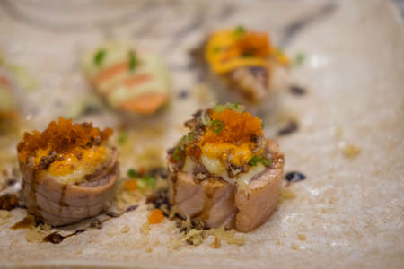 Sushi roll with salmon. Japanese food in restaurantの写真素材