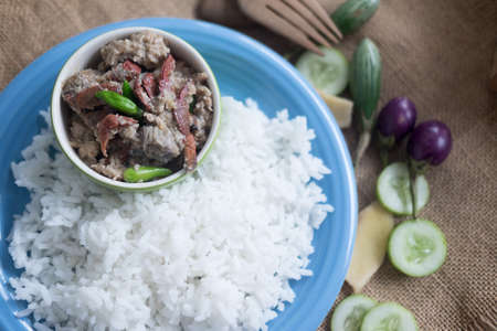 Soft cooked rice (Thai Jasmine rice) served with stew crab dipの写真素材