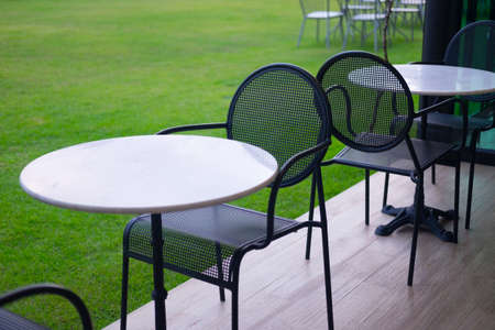 Set chairs of vintage style in garden