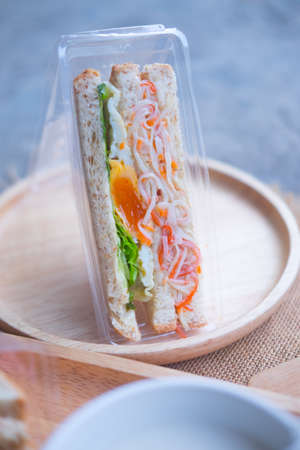 Sandwich with egg and salad in boxの写真素材