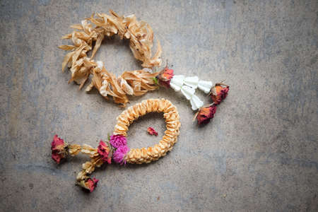 Two dry garland Thai culture on ground