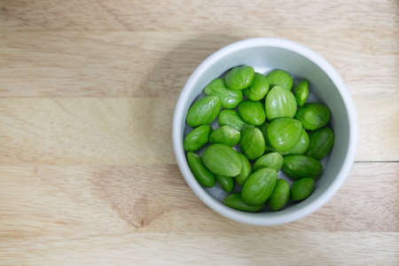 Sato seeds, Parkia speciosa seeds or bitter bean in bowl