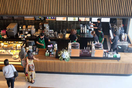 SAMUTPRAKARN, THAILAND - JULY 22, 2018: inside of Starbucks Caffe. A new branch of Starbucks coffee available in Samutprakarn, Thailand. Starbucks is the largest coffee franchises in the world, currently.のeditorial素材
