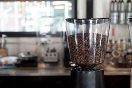 Coffee grinder - Coffee beans in the electric coffee grinder