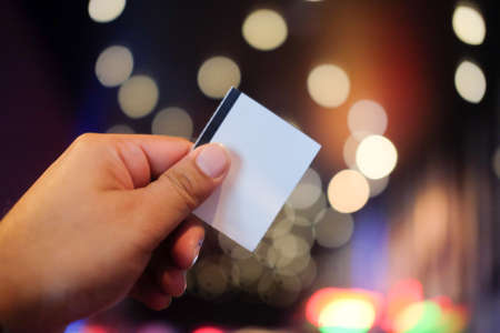 Hand with cinema tickets. Access on entertainment or filmの写真素材