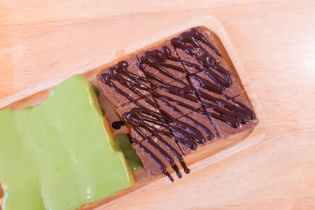 Steamed custard and chocolate jam on slice bread in coffee shop