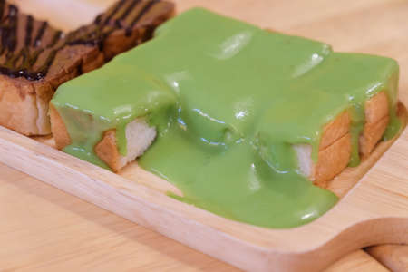 Pandan custard cream on toasted in break timeの写真素材