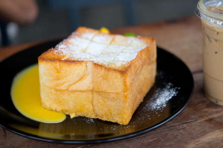 Honey toast a side of orange cream sauce