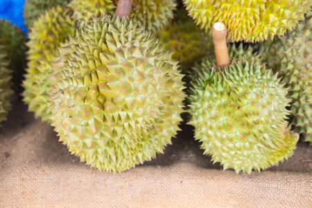 Tropic king of fruit durian on market table.の写真素材