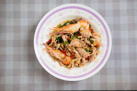 Stir-fried of pork and shrimp mix with basil leaf hot and spicy. Thai popular menuの写真素材