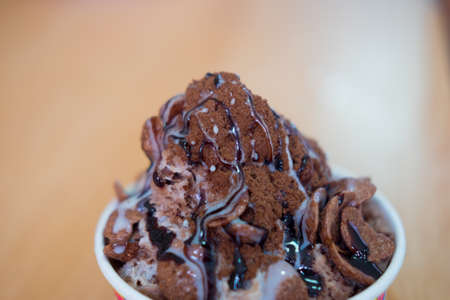 Chocolate ice snowflakes dessert flavor with chocolate powderの写真素材