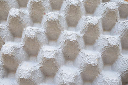 Full frame of paper egg carton, close up
