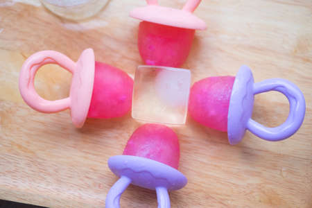 Refreshing homemade popsicle with ice cubeの写真素材