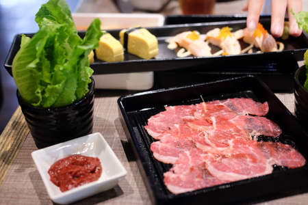 Raw beef and pork prepared for barbeque grill in Korean food is deliciousの写真素材