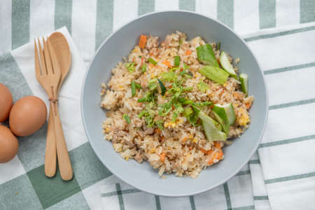 Fried rice mix pork and egg. Thai called "Khao Pad Moo". It easy homemade food in Thailandの写真素材