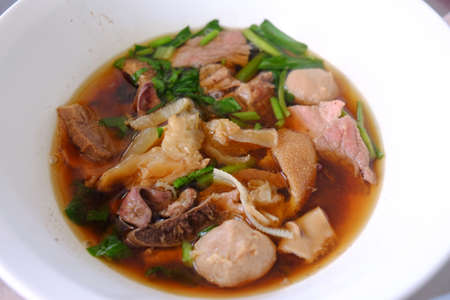 Thai beef soup in white bowl. Selective focusの写真素材