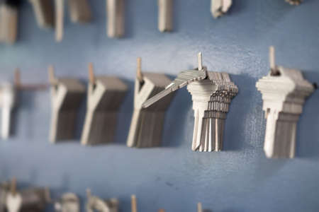 Many keys hanging on wall prepare to make key copy in keys shop