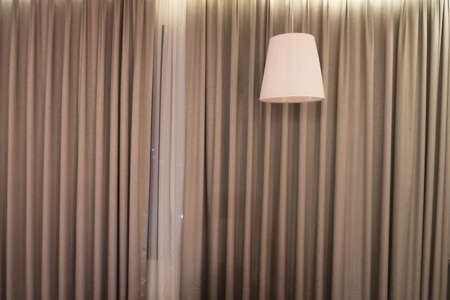 Beautiful ceiling lamp with a curtain. Lighting fixture.の写真素材