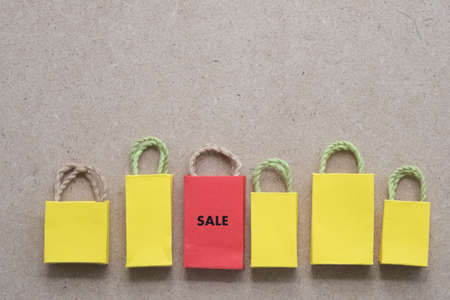 Red shopping bag from recycle paper. Special offer shopping time concept. Copy spaceの写真素材