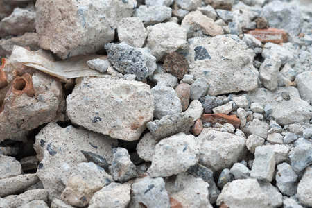 Gray brown texture of stones in a pile of rubbish