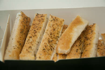 Group of bread sticks in paper boxの写真素材