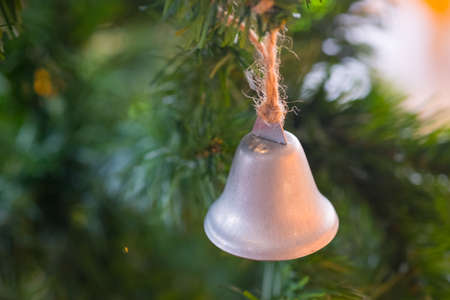 Bell decorate on Christmas Tree, happy new year concept