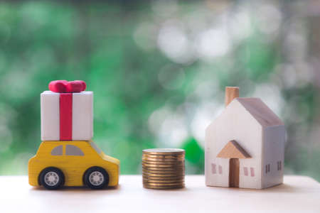 Luxury lifestyle with money , car and house, successful concept (Big surprise by husband giving his...