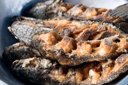 Fried striped snakehead fish ready to Thai cook