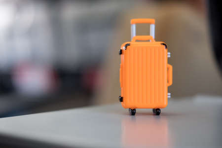 Miniature of orange suitcase : ready for travelの写真素材