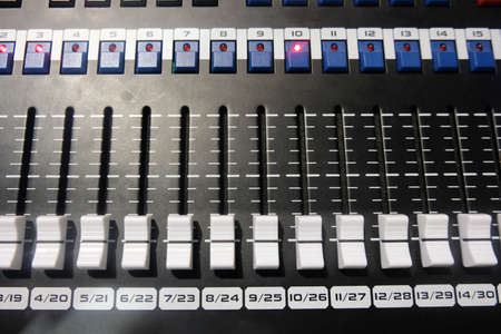 Audio mixing board. Sound mixing console and buttons of mixer controllerの写真素材