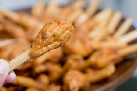 The Sugar cane skewered fried minced shrimps.の写真素材