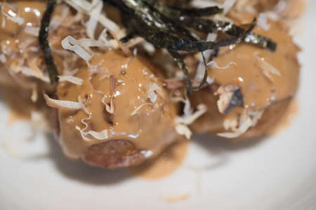 Takoyaki octopus that wrap with flour is delicious Japanese snackの写真素材